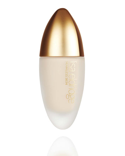 Lisa Eldridge Seamless Skin Foundation in a matte glass bottle with a gold lid. The bottle says ‘Lisa eldridge SEAMLESS SKIN’.
bottleupright