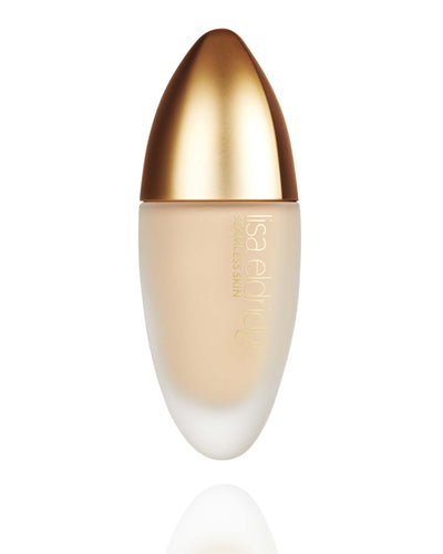 Lisa Eldridge Seamless Skin Foundation Shade No. 11  in a matte glass bottle with a gold lid. The bottle says ‘lisa eldridge SEAMLESS SKIN’